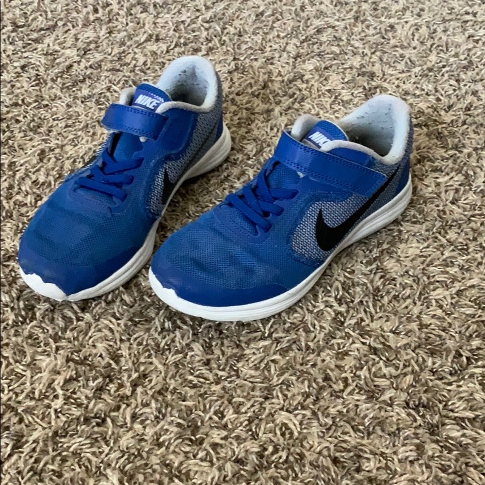 Blue Nike kids shoe